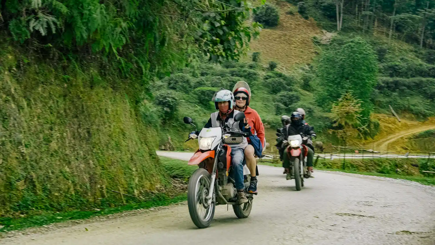 a group of people riding motorcycles on a road-day 3-4-Day Private Tour – Motorbike flipside vietnam
